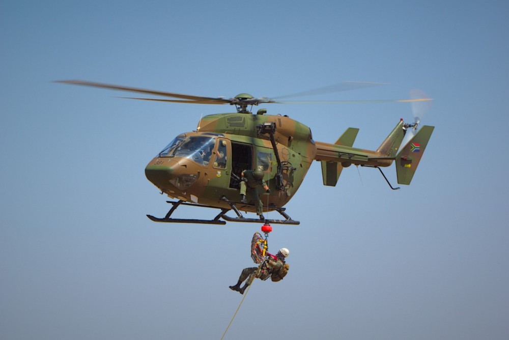 South African Air Force (SAAF) BK117 during preparation for the Africa Aerospace and Defense Expo (AAD) at SAAF Base Waterkloof.  The AAD expo runs over a period of about 6 days where 5 days are trade days and the last two days are open to the public and includes an airshow.