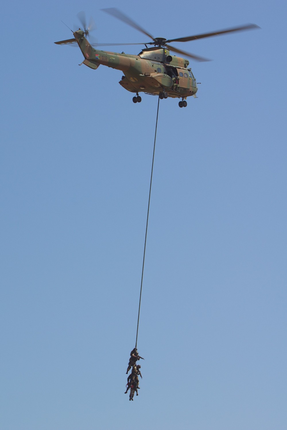 South African Air Force (SAAF) Oryx Helicopter demonstration of extraction of troops. The demonstration was photographed at AAD 2024. The Oryx helicopter is a South African built helicopter.