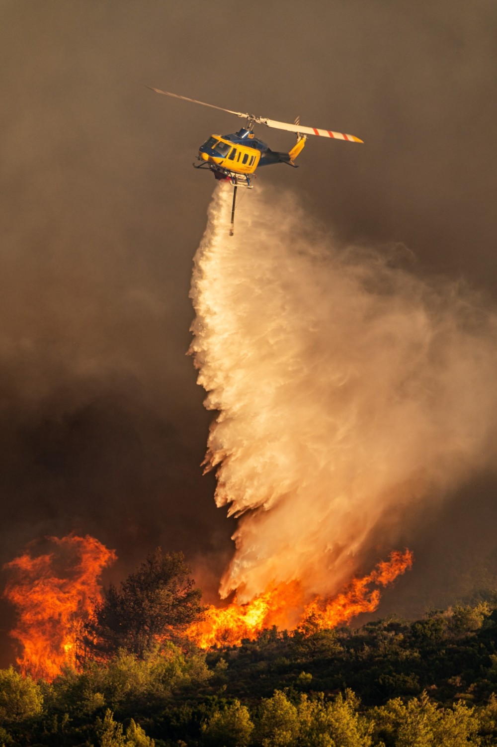 This photo was taken from the biggest fire we had in Attica this year and i was one of the biggest ever.The Bell's did a great work.I managed to get close to the drop zone and this is the result