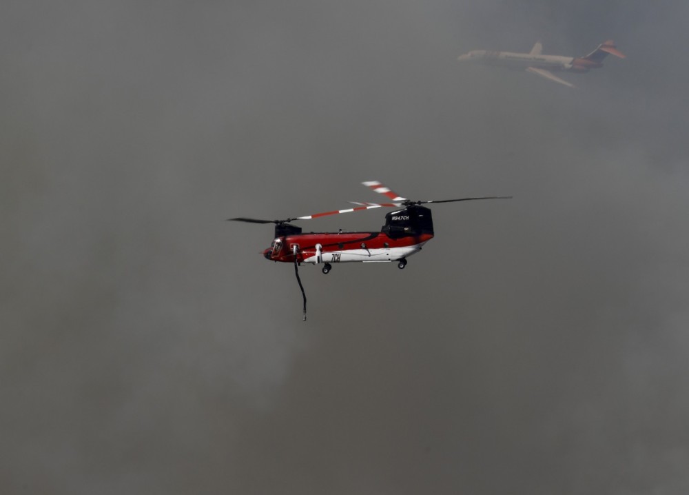 Helimax Aviation Helitanker 7CH flies in tandem with a sneaky Erickson Aero Tanker 107, on a large vegetation fire in Riverside County (CA) known as the Round Fire, in Summer 2024.