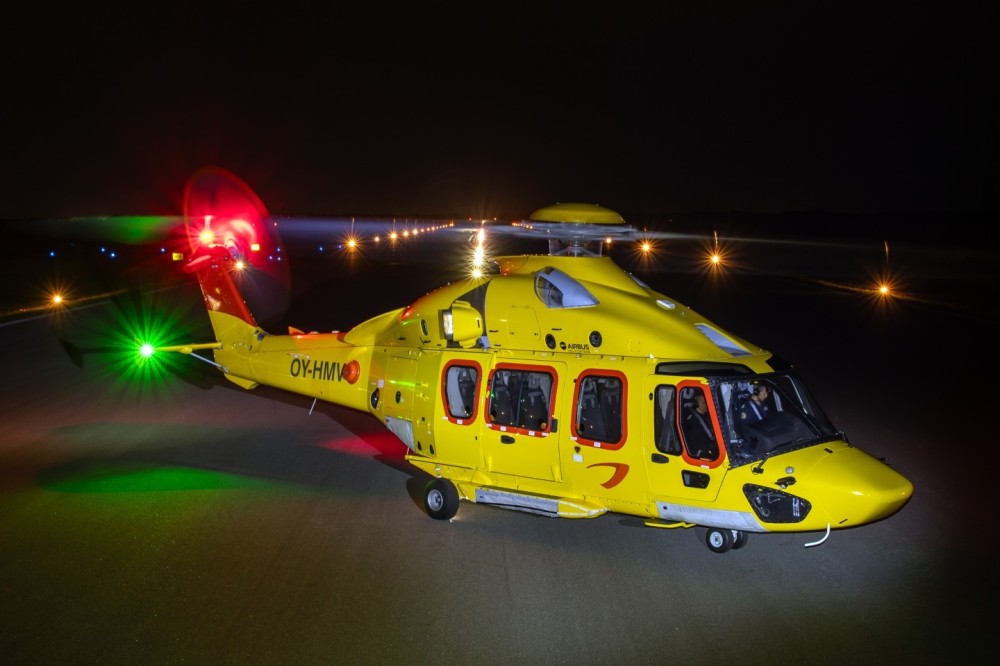 Airbus H175s from the NHV during a night shoot at Esbjerg Airport, Denmark. The H175 helicopters of the NHV fly daily to the oil and gas platforms in the North Sea.