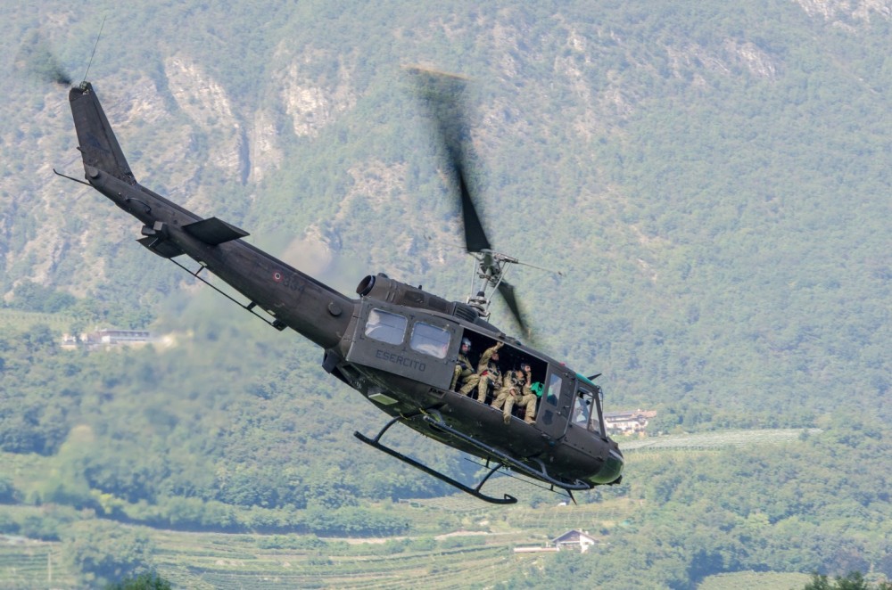 Agusta Bell AB205 Italian Army (Esercito Italiano) in demostration activity with the Alpine Corps at Trento "Aeroporto Caproni"  during "Festivolare Airshow"