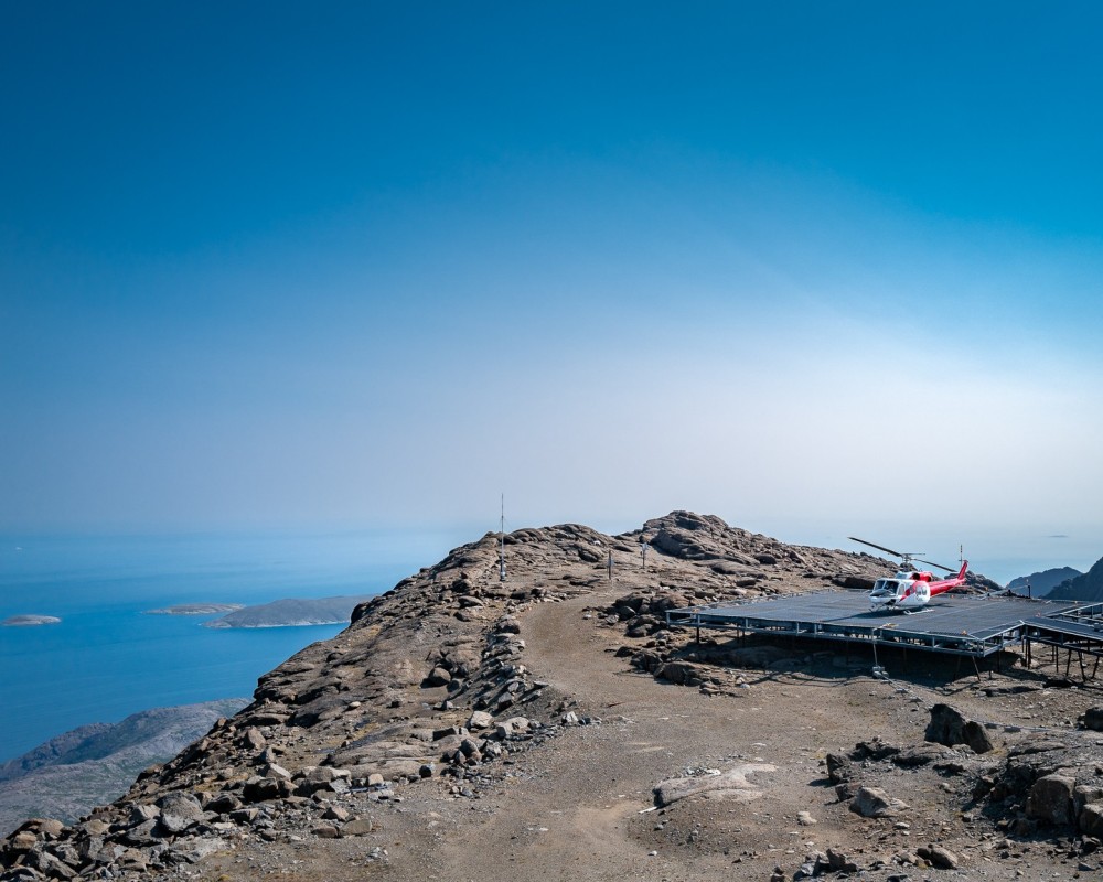 A Bell 212 operated by Canadian Helicopters on the elevated helipad of the short range radar site at Cape Kiglapait, Newfoundland and Labrador, Canada.