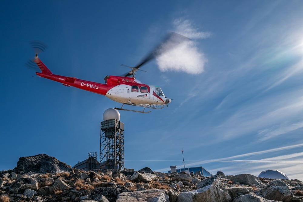 A Bell 212 HP operated by Canadian Helicopters conducting fuel haul functions to radar sites of the North Warning System throughout northern Canada. This site is located at Cape Kakiviak in Newfoundland and Labrador along the Atlantic Ocean.