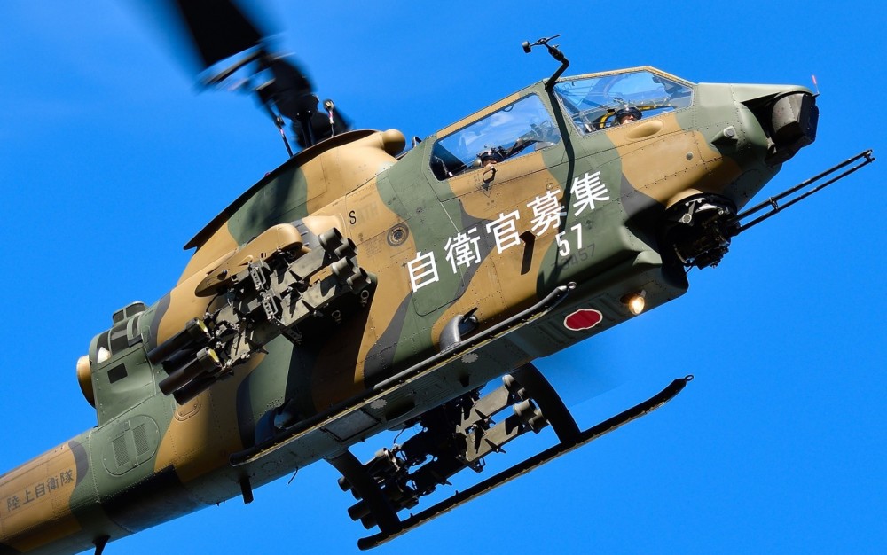 JGSDF AH-1S Step III(similar to AH-1F) is manuvaling in flying demonstration at Camp Akeno.