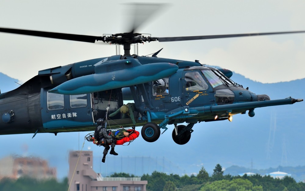 JASDF UH-60J is demonstrating SAR mission with hoisting at Komaki Airport.