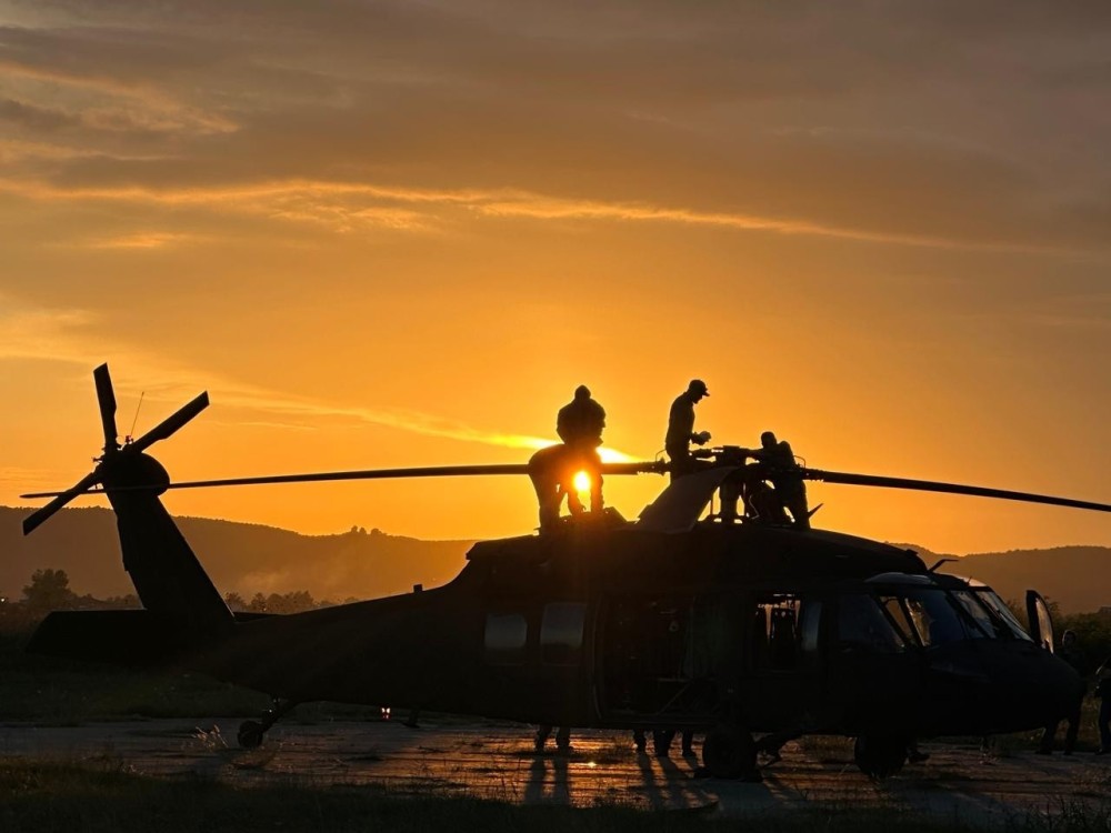 Fixing an UH60 APU igniter box issue while on field and the sunset was coming. The issue was sucessfully fixed and aircraft was relocated at his permanent homebase.