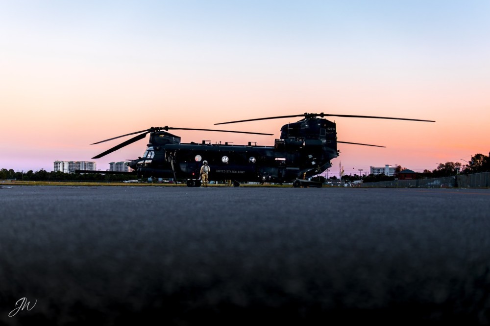 A 160th SOAR Block II MH-47G Chinook rests on the ramp before their dusk sortie along the Emerald Coast.