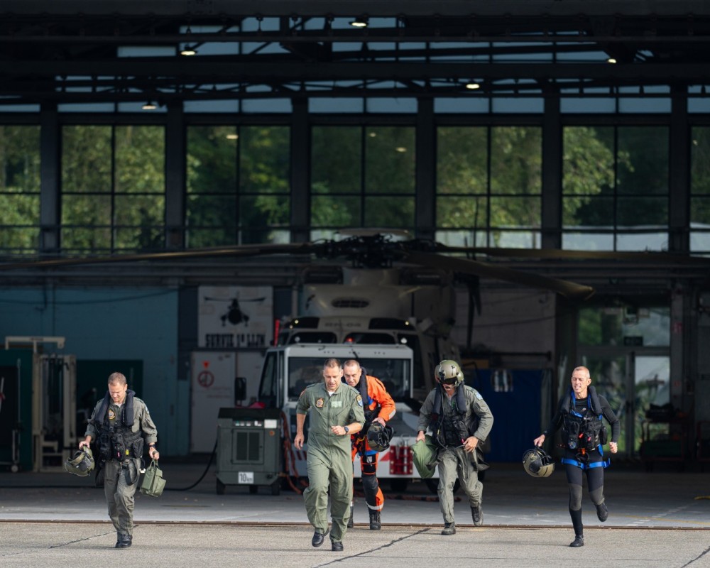 When the scramble bell rings
Belgian Air Force 40th Squadron Search & Rescue NH90
@ home base Koksijde Belgium

from left to right
1st pilot
Cabin operator
Medic
2nd pilot 
Diver