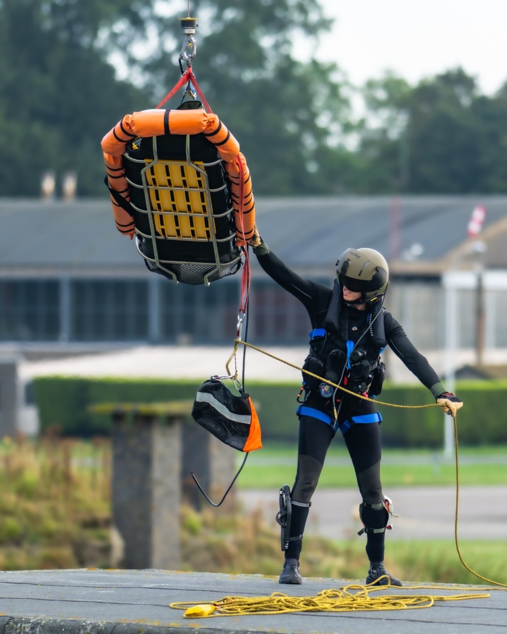 Belgian Air Force 40th Squadron Search & Rescue NH90
@ home base Koksijde Belgium

diver preparing the stretcher for hoisting