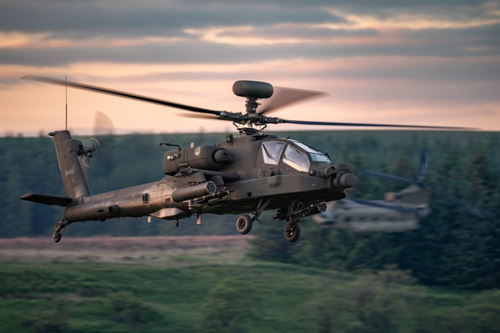 Crossover!

Dutch Apache in the fading light as a Dutch chinook passes behind it. 

Taken during TAC BLAZE on RAF Spadeadam