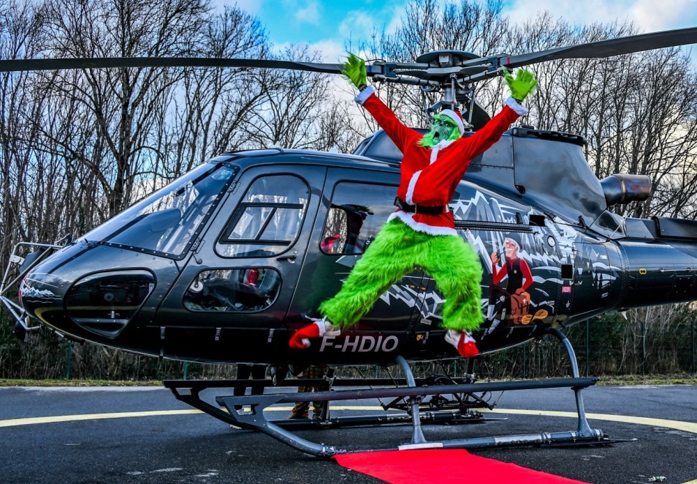 I was joining my H125 B3 helicopter to go on a mission when a man in green named "the grinch" scared me into stealing my helicopter! After discussion we finally left together for the mission