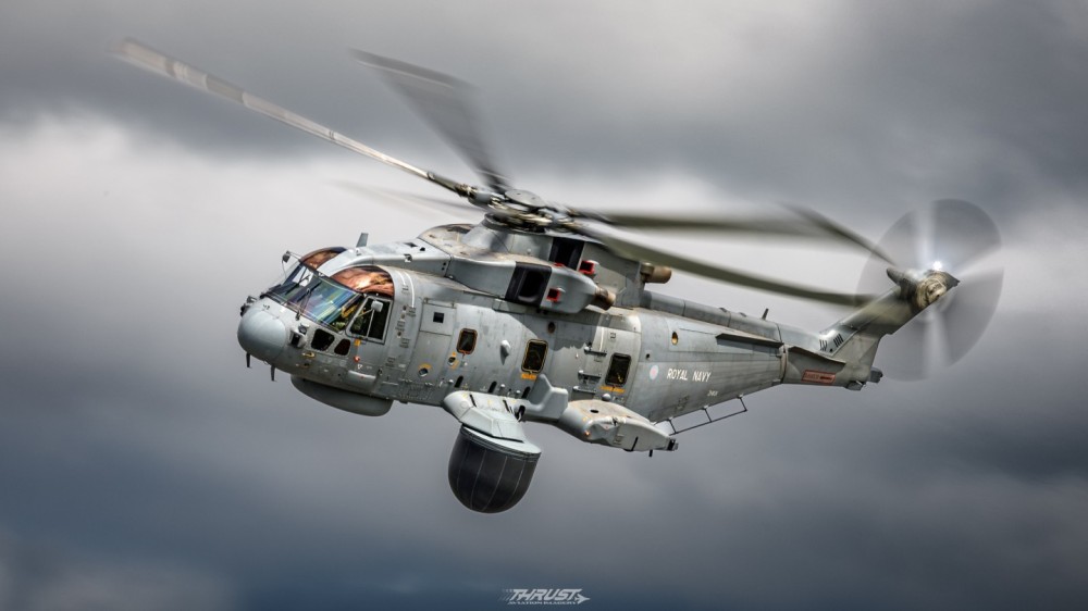 The 'Crowsnest'

Royal Navy Merlin departing The Royal International Air Tattoo destined for its homebase of Royal Naval Air Station Culdrose. This example, from 820 Naval Air Squadron, carries the Airborne Early Warning and Control radar; known as the 'CROWSNEST', which is lowered from the port side of the fuselage. Developed by Lockheed Martin the 'CROWSNEST' provides vital surveillance capability to support the Royal Navy's Queen Elizabeth Class carriers. Using high power radar it provides long-range air, maritime and land tracking capabilities that will ensure early detection of potential threats and vital surveillance for the fleet.