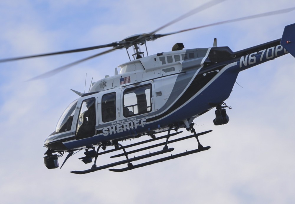 A Bell 407GXI from the San Diego County Sheriff Department's ASTREA Unit, returning from a patrol mission after chasing bad guys, while also assisting a U.S. Customs and Border Protection airship in Lakeside, CA.