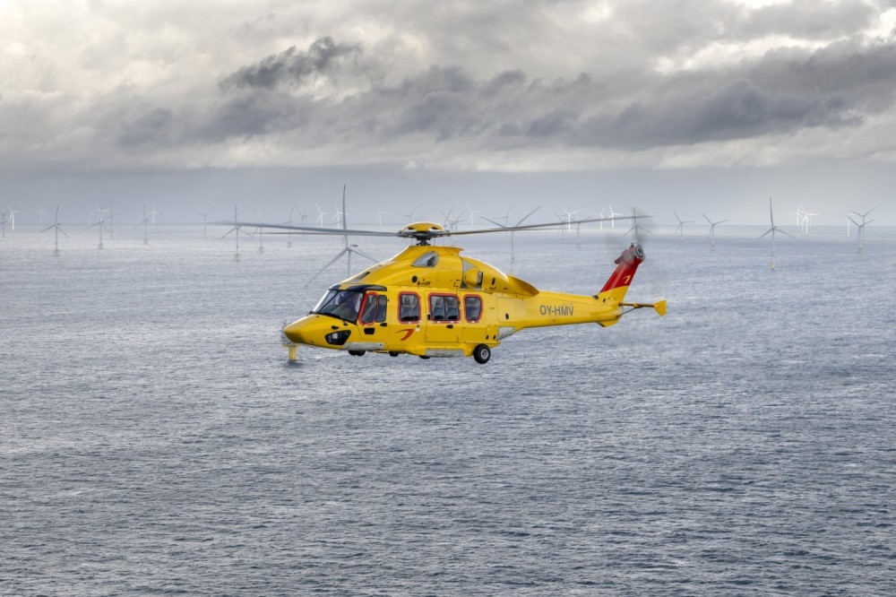 An air-to-air shoot featuring an Airbus H175 from Noordzee Helicopters Vlaanderen (NHV) above the North Sea, with a wind farm in the background.
Noordzee Helicopters Vlaanderen will expand its operations with the H175 into the offshore wind sector.