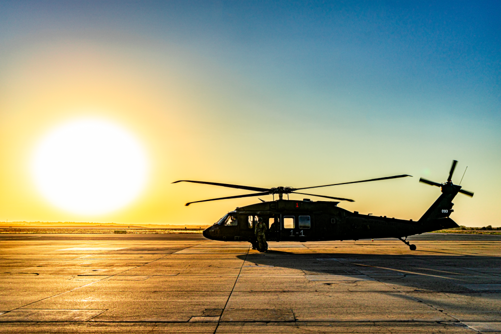 As the sun sets on a long day, Blackhawk 20093 awaits hot refuel at KSLN.  It is the lead aircraft in extensive air assault training.