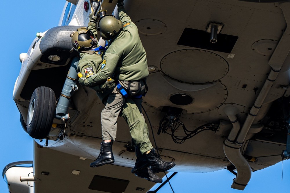 Belgian Airforce 
Airbus Helicopters NH90

Hoisting SAR Medic & Diver into the helicopter