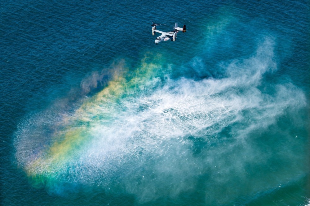 United States Marine Corps MV-22B Osprey '168621' from VMM-268 kicking up a spray hovering over Surfers Paradise Beach during the 2024 Pacific Airshow Gold Coast