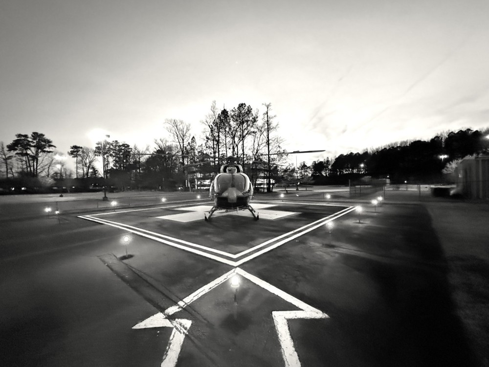 Sunset flights can lead to some great photos.  But a black and white image lets me focus on the subject and not the background.  This photo is of Nightingale Air Ambulance just after a flight from the Outer Banks