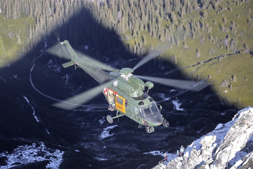 Polish Air Force SAR W-3 with Tatra Mountain Rescuer onboard during training sortie in Tatra mountains.