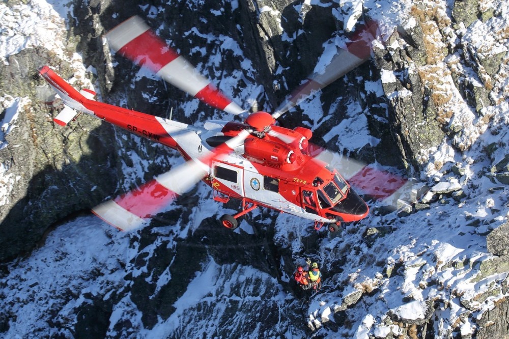 Tatra Mountain Rescuers during hoist operation near Koscielec summit.