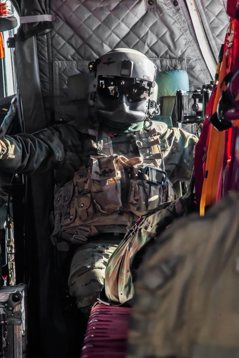 A fundamental part of the Chinook crew is the ramp shooter. 
Photograph taken during a shooting exercise aboard a CH-47 Foxtrot of the Spanish Army Aviation