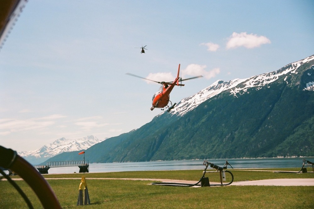 2 ASTARs depart the Skagway base for a nearby glacier on a beautiful Alaskan summer day. Shot on 35mm ECTAR 100 film and developed by Dale Labs.