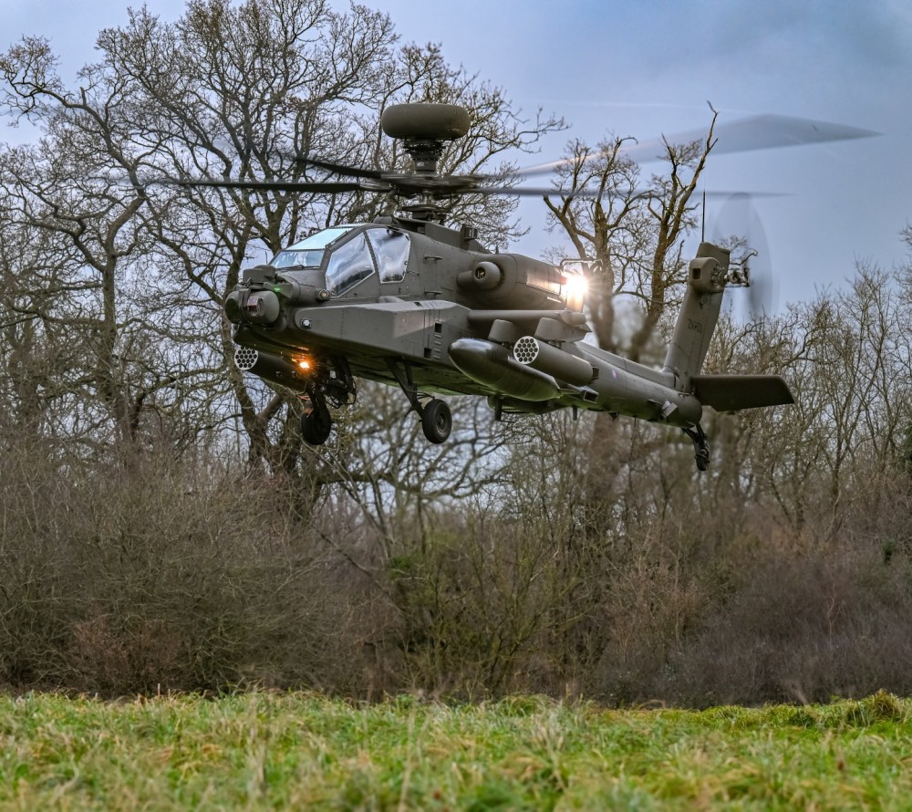 An Army Air Corps AH64E operating in a confined area