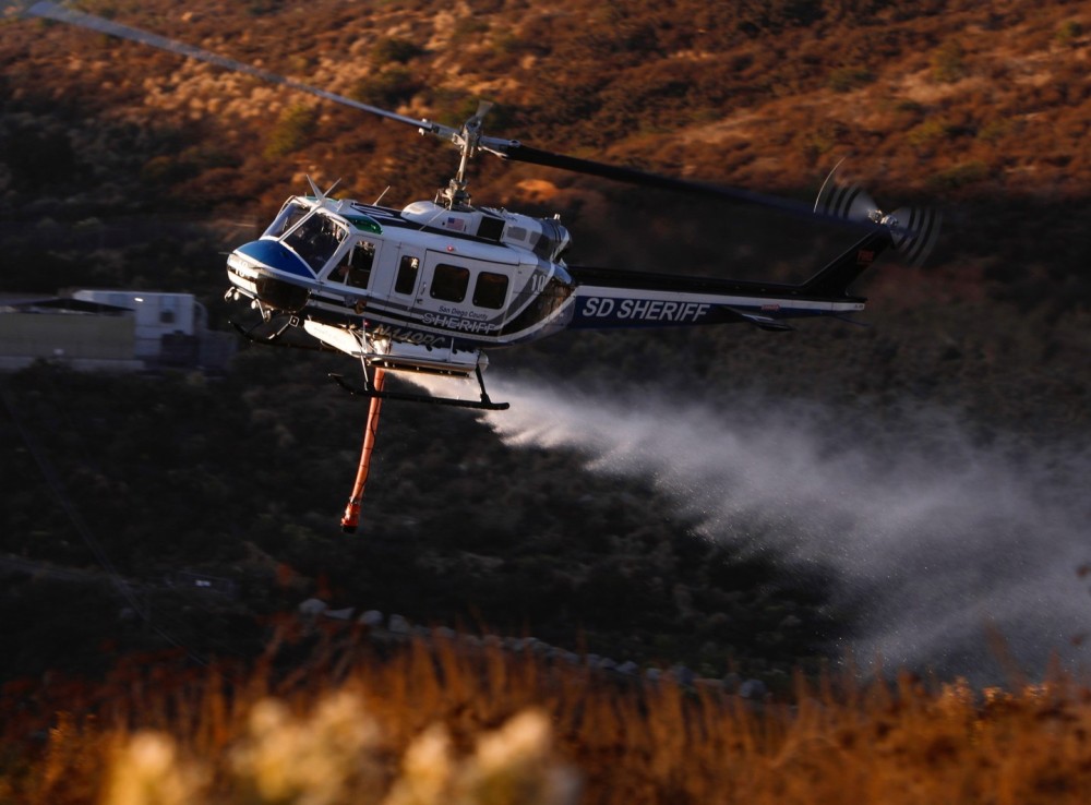 Copter 10 from the San Diego County Sheriff Department's Air Unit, emergency jettisons its payload following a cancelation from incident during a vegetation fire in Jamul, CA.