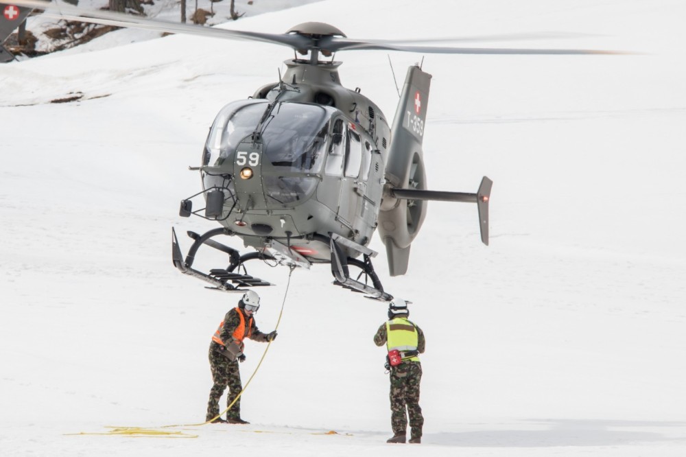 Swiss Air Force helicopter at work in Arolla in Valais (Switzerland). Transport for the organisation of the ‘Patrouille des Glaciers’ ski mountaineering race between Zermatt and Verbier. Eurocopter EC635P2, T-359