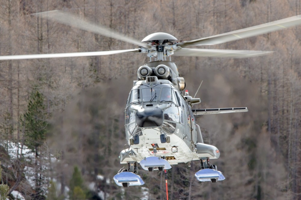 Swiss Air Force helicopter at work in Arolla in Valais (Switzerland). Transport for the organisation of the ‘Patrouille des Glaciers’ ski mountaineering race between Zermatt and Verbier. AS332 M1 Super Puma, T-319