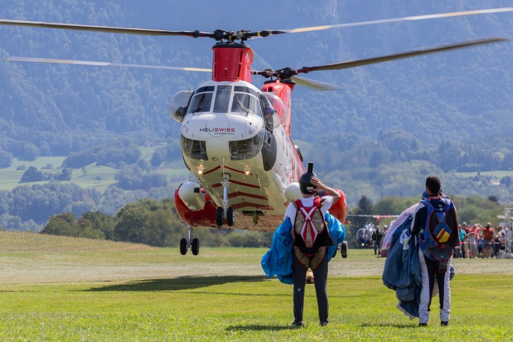 Columbia Vertol helicopter of Heliswiss at an open day at Bex airfield in Switzerland. Parachute drop flight. Powerful, reliable tandem rotor helicopter, Columbia 107-II Vertol. 07.09.2024, Bex, Switzerland.