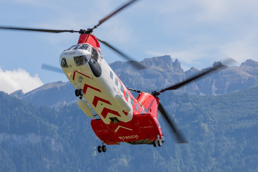 Columbia Vertol helicopter of Heliswiss at an open day at Bex airfield in Switzerland. Parachute drop flight. Powerful, reliable tandem rotor helicopter, Columbia 107-II Vertol. 07.09.2024, Bex, Switzerland.