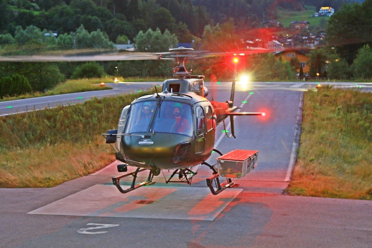 AS350 (OE-XME) of HeliAustria coming back to base after mountain working mission in Austria. HeliAustria is based in St. Johann / Pongau. There are a lot of different choppers based.