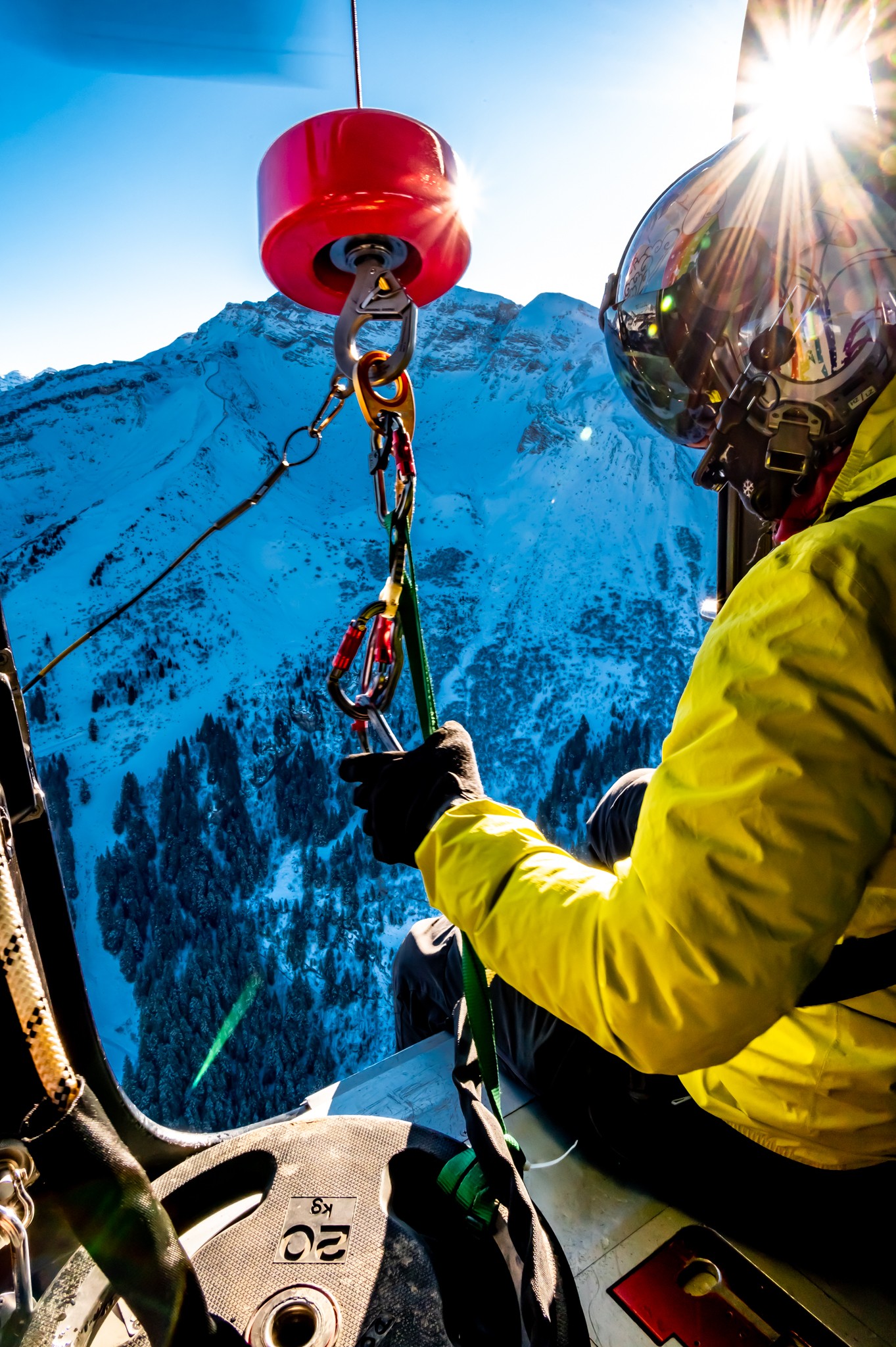 Photo on board an EC135 from the company MontBlanc Hélicoptère the operator is carrying out an approach and winching exercise before the rescue season in the ski resort of Avoriaz.