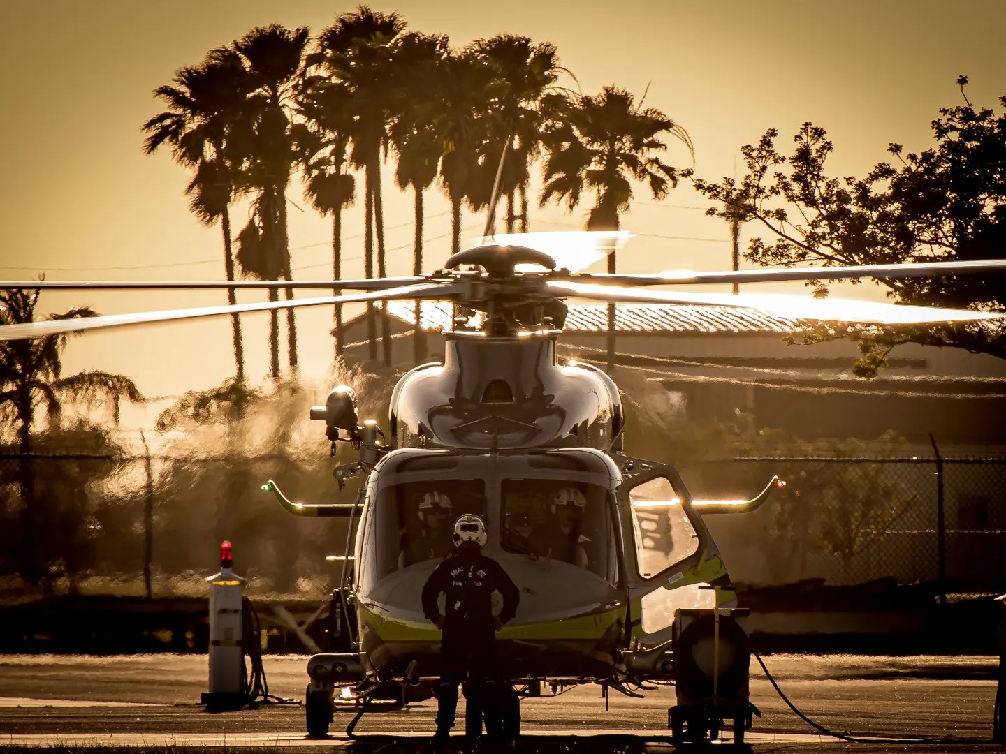 Miami Dade Fire Rescue's Air Rescue 2, is pictured here at the Southern District Air Station in Tamiami Airport, getting prepped to depart to conduct observation operations on a brush Fire nearby.