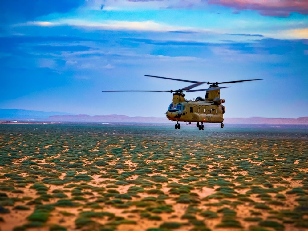 CH-47F Chinook over the Texas dessert with a beautiful sky in the background. I took this while on a training flight during our annual training in June.