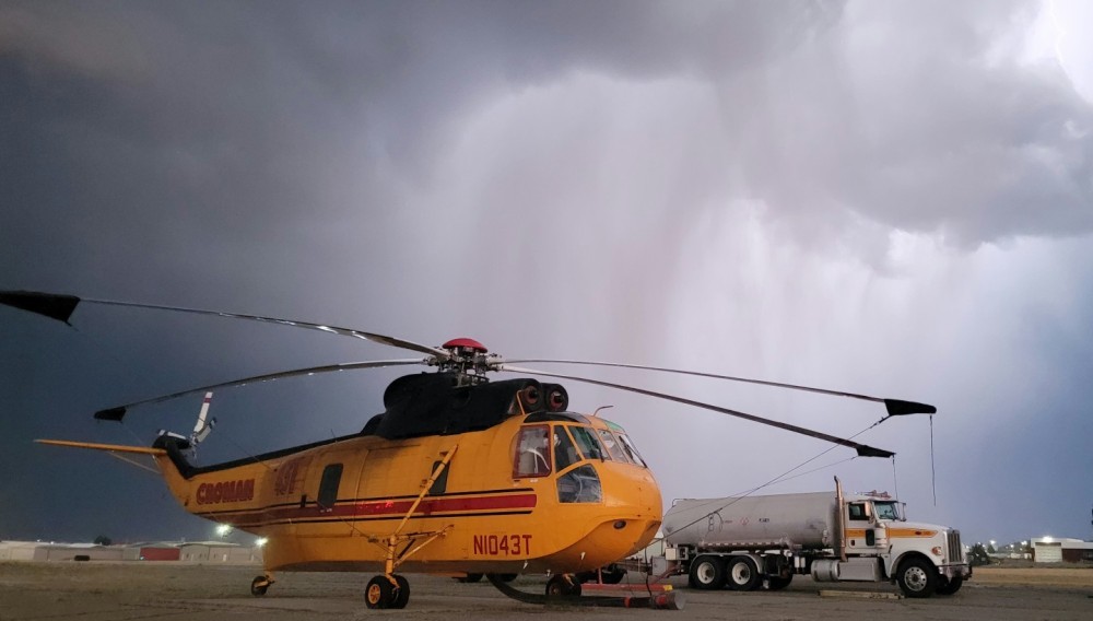 Photo was taken around 8:30 PM, huge storm was rolling in so we tie down the aircraft and took a couple pictures. Snapped about 20 pictures and finally got one with the lightning lighting up the huge storm cell that was coming into the Helena airport.