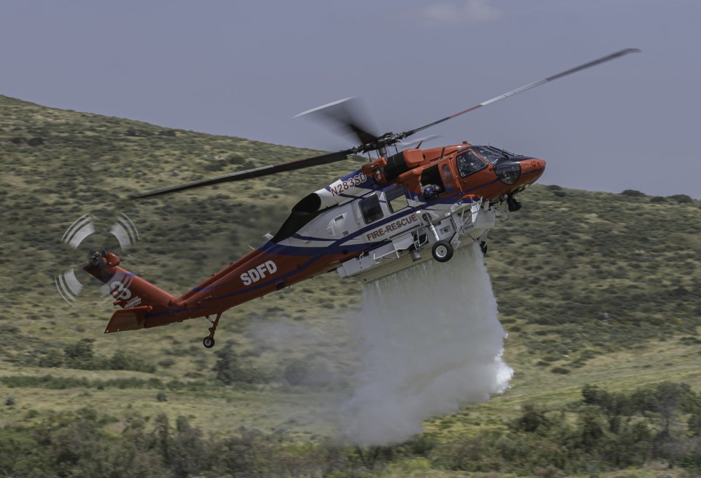 San Diego Fire-Rescue Copter 3 making a drop during the San Diego County wildland drill. The drill took place for three days from April 30th through May 2nd. Various agencies throughout the county participated.