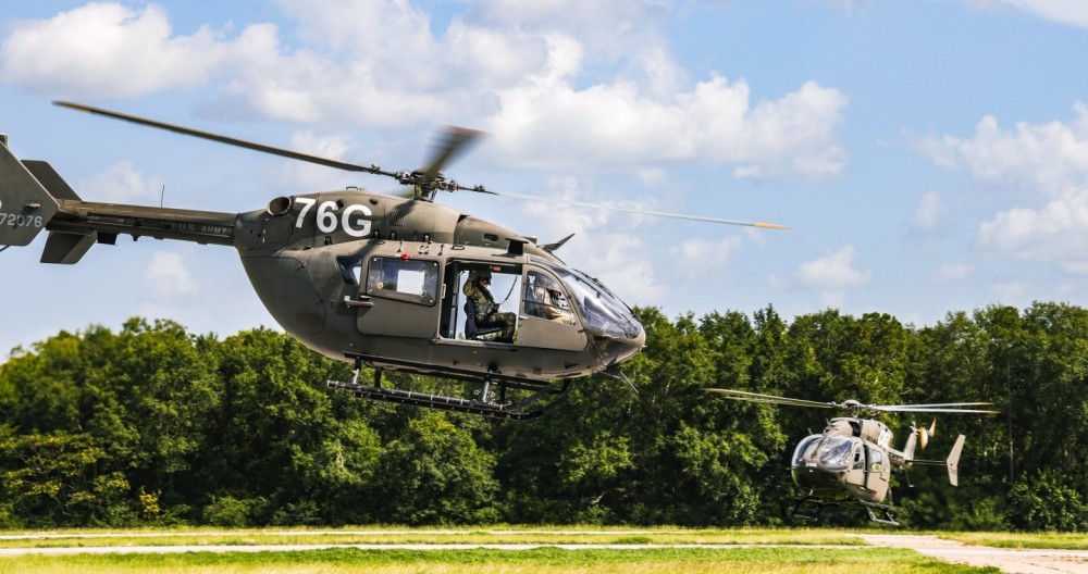 Two UH-72 Lakota helicopters hover at a training airfield at Fort Novosel, Alabama. The Lakota is the primary training helicopter for the United States Army and is utilized for the entirety of Initial Entry Rotary Wing training for Army officers and warrant officers.