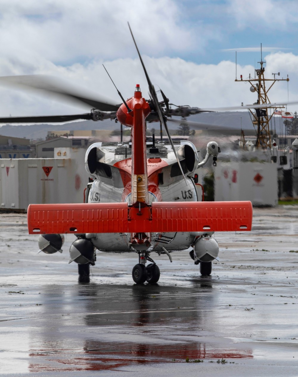 Sikorsky made MH-60T Jayhawk assigned to Coast Guard Air Station San Diego, CA prepares to launch on a rescue mission off the San Diego coast during a break in wet weather.