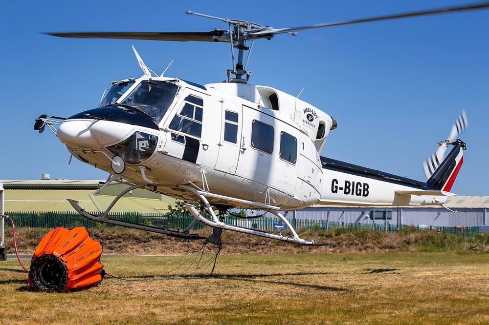 Fire Fighting in the Midlands (UK). Calls for regular refuels! G-BIGB hard at work with a long day for the pilots taking it in turns, photographed in Doncaster (Sandtoft Airfield).