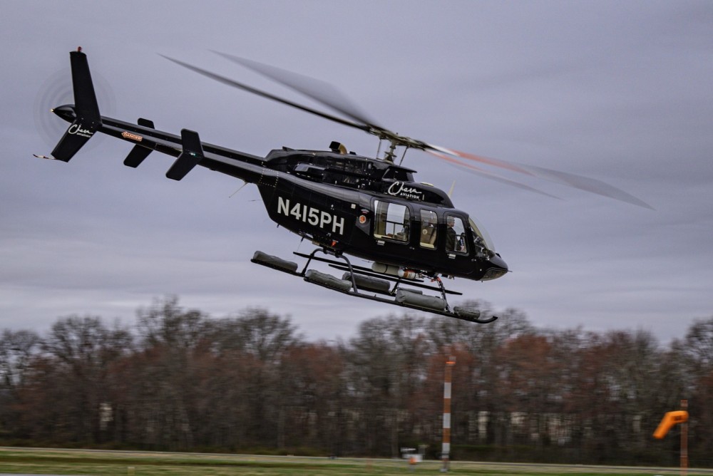 Charm 4, A legacy Bell 407 leased from PHI, Departing Caldwell to begin flying sightseeing tours at the Wall Street Heliport in New York City.