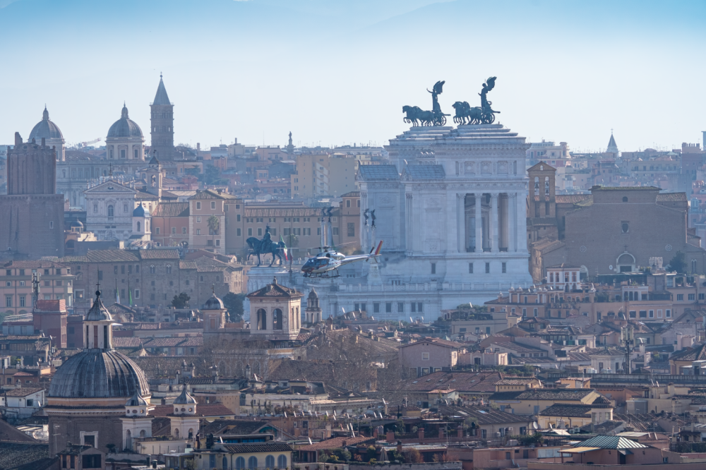 Airbus AS355 HELIWEST ​​during aerial filming of the Rome Marathon                                                          .                                                                                                                                                                       .