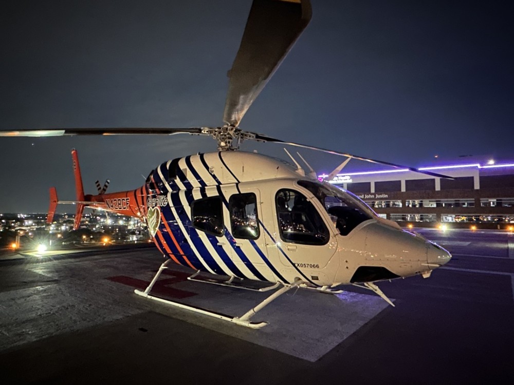 CareFlite Bell 429 on top of  Harris Methodist hospital Fort Worth Texas. Waiting for the call to aid in the transport of sick and injured. CareFlite operates two Bell 429 one located in Fort Worth and the other located in Dallas